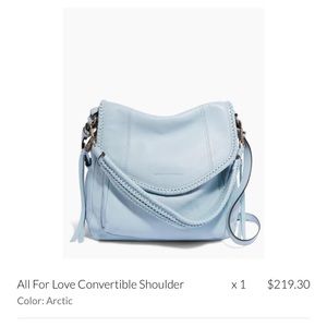 Aimee Kestenberg light blue leather handbag.
